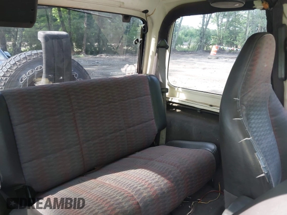 1999 Jeep Wrangler Sport with VIN 1J4FY19S1XP417362, listed as a IAAI auction lot 42738296 with 228,066 mi miles and . Bid and sale history available at DreamBid. Image 8.