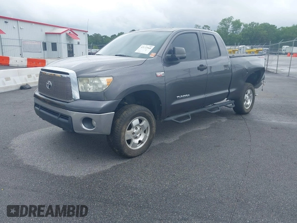 2012 Toyota Tundra z VIN 5TFUW5F10CX265994, wystawiony jako IAAI lot #42172968 z przebiegiem 197 493 mil mil oraz . Historia ofert i sprzedaży dostępna na DreamBid. Obrazek 18.