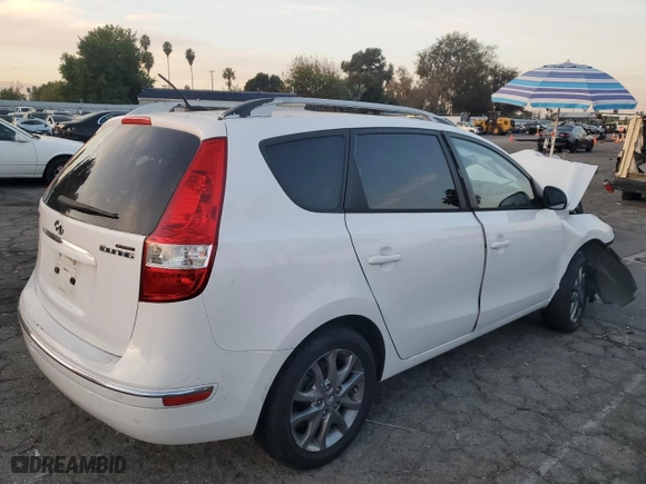 2012 Hyundai Elantra Touring SE with VIN KMHDC8AE3CU151098, listed as a Copart auction lot 82891044 with 128,180 mi miles and Salvage Title. Bid and sale history available at carsss.com. Image 3.