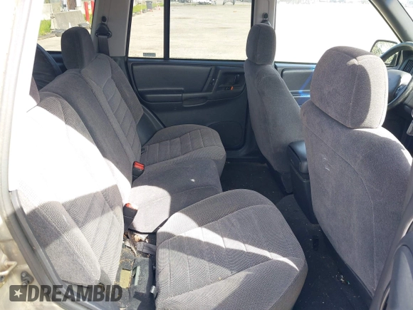 1997 Jeep Grand Cherokee Laredo with VIN 1J4GZ58S5VC500257, listed as a IAAI auction lot 41996034 with 222,513 mi miles and . Bid and sale history available at DreamBid. Image 8.