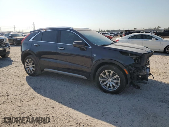 2022 Cadillac XT4 FWD Premium Luxury z VIN 1GYFZCR44NF151123, wystawiony jako Copart lot #50312745 z przebiegiem 46 820 mil mil oraz Szkoda całkowita • Salvage title. Historia ofert i sprzedaży dostępna na DreamBid. Obrazek 4.