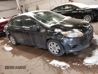 2012 Ford Focus SE with VIN 1FAHP3F2XCL414212, listed as a IAAI auction lot 41472826 with 162,025 mi miles. Bid and sale history available at carsss.com. Image 1.