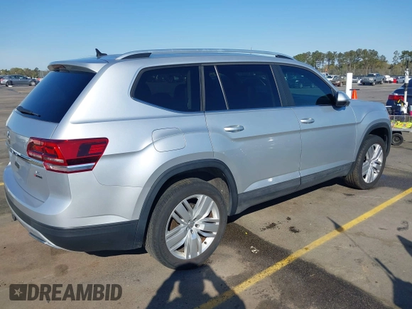 2019 Volkswagen Atlas SE with VIN 1V2UR2CA9KC527512, listed as a IAAI auction lot 41882212 with 102,765 mi miles and . Bid and sale history available at DreamBid. Image 4.