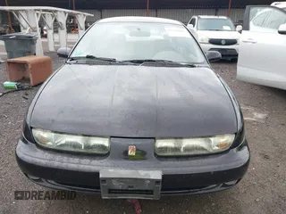 1999 Saturn SL with VIN 1G8ZK5272XZ263163, listed as a IAAI auction lot 42180002 with 138,463 mi miles. Bid and sale history available at carsss.com. Image 6.
