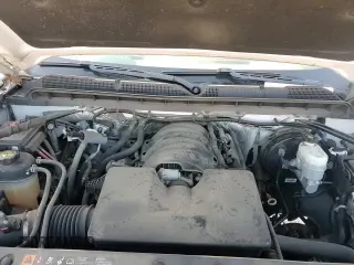 2018 Chevrolet Silverado 1500 Work Truck z VIN 1GCNCNEH3JZ303585, wystawiony jako Copart lot #67949625 z przebiegiem 120 096 mil mil oraz Szkoda całkowita • Salvage title. Historia ofert i sprzedaży dostępna na DreamBid. Obrazek 13.