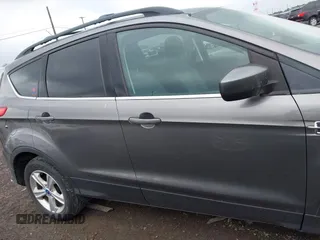 2013 Ford Escape SE with VIN 1FMCU9GX4DUB35629, listed as a IAAI auction lot 42446685 with 103,420 mi miles and . Bid and sale history available at DreamBid. Image 13.