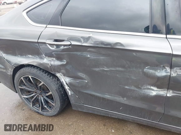 2019 Ford Fusion SEL with VIN 3FA6P0CD6KR141832, listed as a IAAI auction lot 41800102 with 142,282 mi miles and . Bid and sale history available at DreamBid. Image 20.