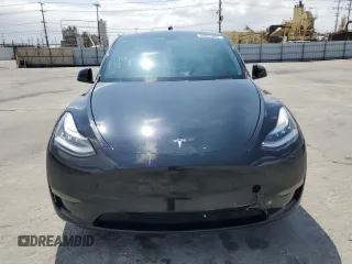 2020 Tesla Model Y Long Range with VIN 5YJYGDEE6LF051549, listed as a Copart auction lot 55063805 with 77,861 mi miles and Salvage Title. Bid and sale history available at DreamBid. Image 5.