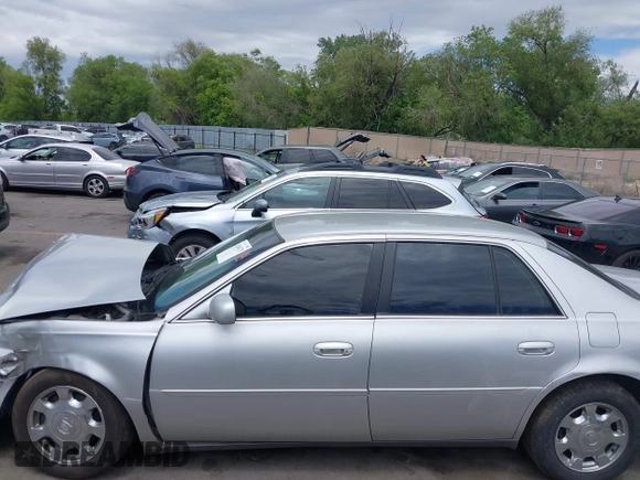 2002 Cadillac DeVille z VIN 1G6KD54Y22U108080, wystawiony jako IAAI lot #42304179 z przebiegiem 278 141 mil mil oraz . Historia ofert i sprzedaży dostępna na DreamBid. Obrazek 14.