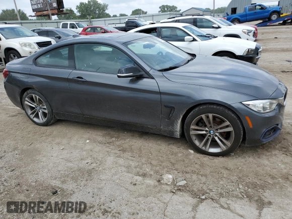 2014 BMW 4 Series 428i xDrive with VIN WBA3N5C51EF717379, listed as a Copart auction lot 59744615 with 112,800 mi miles and Clean title. Bid and sale history available at DreamBid. Image 4.