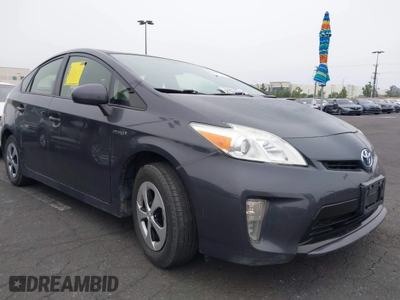 2015 Toyota Prius Four z VIN JTDKN3DU6F1977249, wystawiony jako IAAI lot #42490112 z przebiegiem 173 479 mil mil oraz . Historia ofert i sprzedaży dostępna na DreamBid. Obrazek 1.