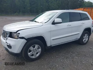 2013 Jeep Grand Cherokee Laredo с VIN 1C4RJEAG6DC647164, выставлен на аукционе IAAI как лот 42282295 с пробегом 128 511 миль миль и . История ставок и продаж доступна на DreamBid. Изображение 2.