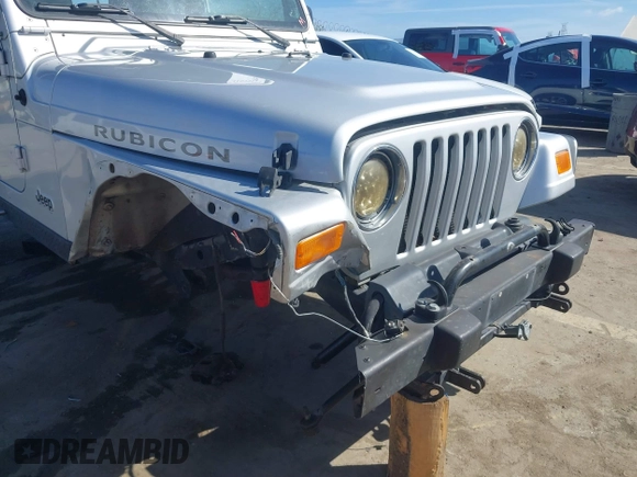 2004 Jeep Wrangler Rubicon with VIN 1J4FA69S94P701660, listed as a IAAI auction lot 41699554 with 74,640 mi miles. Bid and sale history available at carsss.com. Image 6.