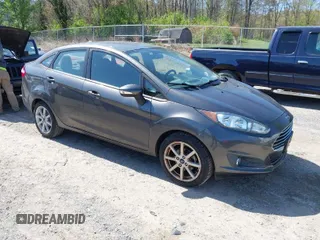 2015 Ford Fiesta SE with VIN 3FADP4BJ6FM105731, listed as a IAAI auction lot 41994903 with 150,189 mi miles. Bid and sale history available at carsss.com. Image 1.