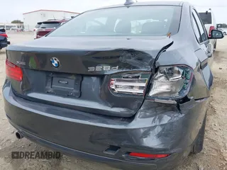 2014 BMW 3 Series 328d xDrive with VIN WBA3D5C59EKX96701, listed as a IAAI auction lot 40716972 with 163,775 mi miles. Bid and sale history available at carsss.com. Image 6.