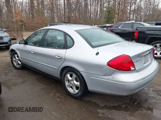 2003 Ford Taurus SE Standard with VIN 1FAFP53273G132268, listed as a IAAI auction lot 41790335 with 202,724 mi miles. Bid and sale history available at carsss.com. Image 3.