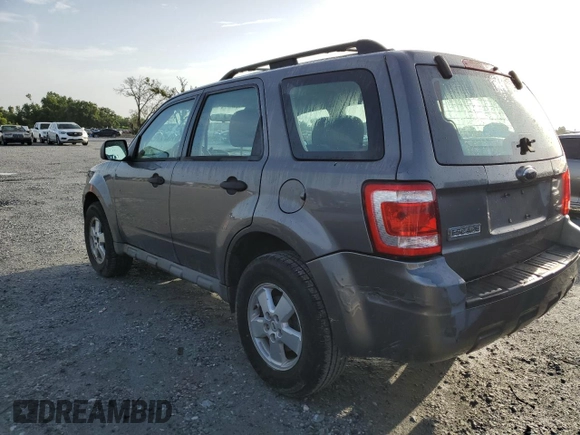 2009 Ford Escape XLS with VIN 1FMCU92749KB94402, listed as a Copart auction lot 60975645 with 171,202 mi miles and Clean title. Bid and sale history available at DreamBid. Image 2.