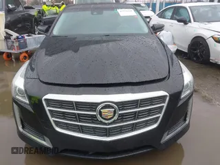 2014 Cadillac CTS Luxury AWD with VIN 1G6AX5SX3E0156938, listed as a IAAI auction lot 41574318 with 151,585 mi miles and . Bid and sale history available at DreamBid. Image 12.