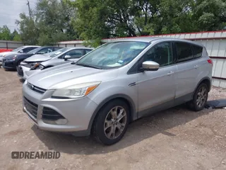 2013 Ford Escape SEL with VIN 1FMCU9H95DUA48886, listed as a IAAI auction lot 42117937 with 244,101 mi miles. Bid and sale history available at carsss.com. Image 2.
