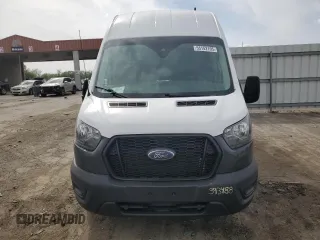 2021 Ford Transit Cargo z VIN 1FTBR1X84MKA46389, wystawiony jako Copart lot #58608695 z przebiegiem 72 951 mil mil oraz Szkody całkowita. Historia ofert i sprzedaży dostępna na DreamBid. Obrazek 5.