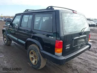 1999 Jeep Cherokee Sport with VIN 1J4FF68S0XL593508, listed as a IAAI auction lot 41526227 with 237,838 mi miles. Bid and sale history available at carsss.com. Image 3.