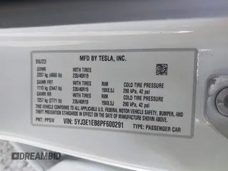 2023 Tesla Model 3 Long Range with VIN 5YJ3E1EB8PF600291, listed as a IAAI auction lot 41651156 with 37,055 mi miles and . Bid and sale history available at DreamBid. Image 9.