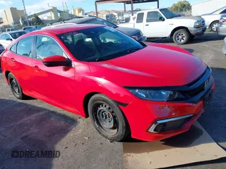 2020 Honda Civic LX z VIN 2HGFC2F6XLH520880, wystawiony jako IAAI lot #40710868 z przebiegiem 74 689 mil mil oraz . Historia ofert i sprzedaży dostępna na DreamBid. Obrazek 1.