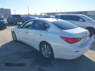 2014 Infiniti Q50 z VIN JN1BV7AP2EM681053, wystawiony jako IAAI lot #41395566 z przebiegiem 230 055 mil mil oraz . Historia ofert i sprzedaży dostępna na DreamBid. Obrazek 3.