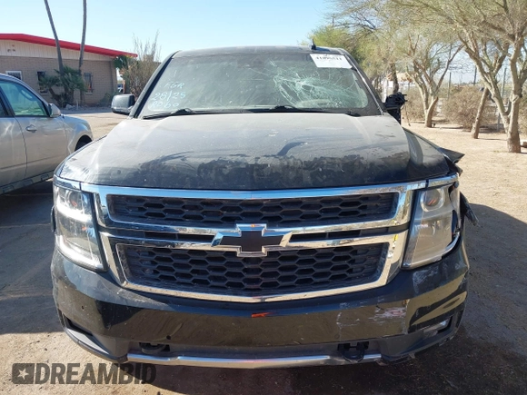 2020 Chevrolet Suburban LT with VIN 1GNSKHKC5LR303081, listed as a IAAI auction lot 41896511 with 60,121 mi miles and . Bid and sale history available at DreamBid. Image 11.