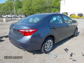 2018 Toyota Corolla L with VIN 2T1BURHE5JC044441, listed as a IAAI auction lot 42244017 with Not provided miles and . Bid and sale history available at DreamBid. Image 4.