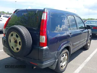 2006 Honda CR-V LX with VIN JHLRD785X6C030024, listed as a IAAI auction lot 42210266 with 108,010 mi miles and . Bid and sale history available at carsss.com. Image 4.