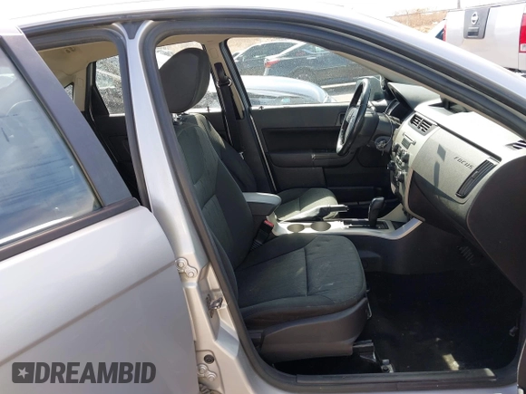 2009 Ford Focus SE z VIN 1FAHP35N99W173410, wystawiony jako IAAI lot #41648274 z przebiegiem 168 767 mil mil oraz . Historia ofert i sprzedaży dostępna na DreamBid. Obrazek 5.