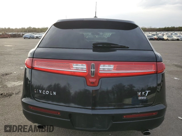 2019 Lincoln MKT with VIN 2LMHJ5NKXKBL02985, listed as a Copart auction lot 80615654 with 112,112 mi miles and Salvage Title. Bid and sale history available at DreamBid. Image 6.