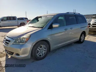 2006 Honda Odyssey EX-L z VIN 5FNRL38756B004864, wystawiony jako Copart lot #56848385 z przebiegiem 134 973 mil mil oraz Szkoda całkowita • Salvage title. Historia ofert i sprzedaży dostępna na DreamBid. Obrazek 1.