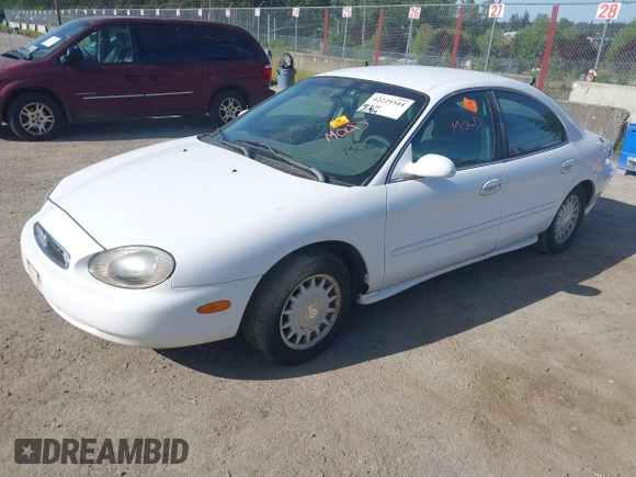 1997 Mercury Sable GS with VIN 1MELM50U4VG644616, listed as a IAAI auction lot 42229344 with 121,780 mi miles and . Bid and sale history available at DreamBid. Image 2.