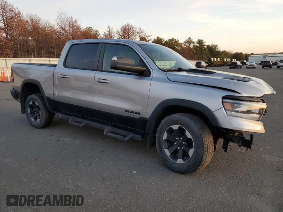 2019 Ram 1500 Rebel z VIN 1C6SRFLT2KN698535, wystawiony jako Copart lot #81854214 z przebiegiem 61 586 mil mil oraz Czysty tytuł • Clean title. Historia ofert i sprzedaży dostępna na DreamBid. Obrazek 4.