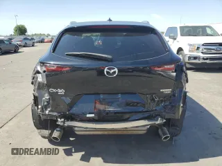 2023 Mazda CX-30 Premium Plus with VIN 3MVDMBEY0PM578346, listed as a Copart auction lot 58572345 with 14,027 mi miles and Salvage title. Bid and sale history available at DreamBid. Image 6.