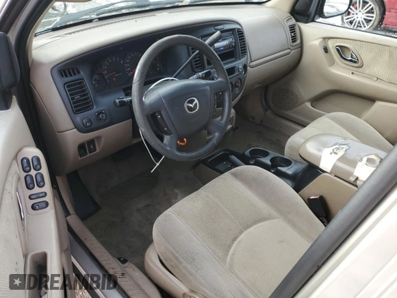 2001 Mazda Tribute LX with VIN 4F2CU081X1KM70119, listed as a Copart auction lot 89311935 with 176,851 mi miles and Salvage Title. Bid and sale history available at DreamBid. Image 8.