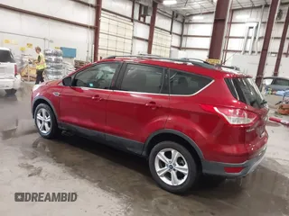 2014 Ford Escape SE z VIN 1FMCU9GX5EUA05294, wystawiony jako IAAI lot #42282028 z przebiegiem 119 046 mil mil oraz . Historia ofert i sprzedaży dostępna na DreamBid. Obrazek 3.