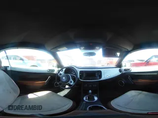 2015 Volkswagen Beetle 1.8T w/Tech with VIN 3VW517AT9FM810122, listed as a IAAI auction lot 41815980 with 72,420 mi miles and . Bid and sale history available at DreamBid. Image 18.