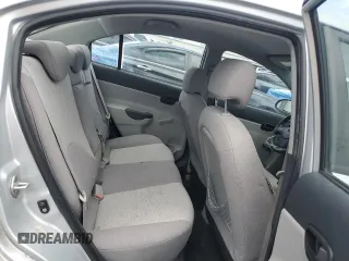 2009 Hyundai Accent Auto GLS z VIN KMHCN46C19U373167, wystawiony jako Copart lot #60026445 z przebiegiem 94 736 mil mil oraz Szkoda całkowita • Salvage title. Historia ofert i sprzedaży dostępna na DreamBid. Obrazek 10.