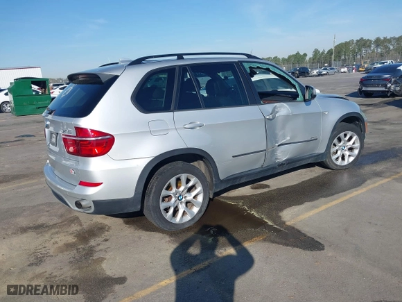 2011 BMW X5 35i with VIN 5UXZV4C5XBL412661, listed as a IAAI auction lot 41810470 with 168,470 mi miles. Bid and sale history available at carsss.com. Image 4.