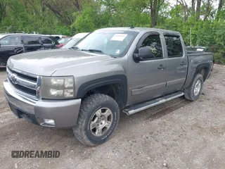 2007 Chevrolet Silverado 1500 LTZ with VIN 2GCEK13M471660691, listed as a IAAI auction lot 42152051 with 210,906 mi miles. Bid and sale history available at carsss.com. Image 2.