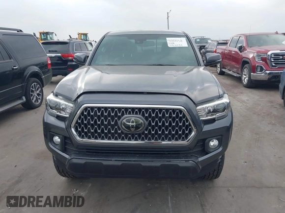 2018 Toyota Tacoma SR with VIN 5TFCZ5AN6JX127774, listed as a IAAI auction lot 41801158 with 28,161 mi miles and . Bid and sale history available at DreamBid. Image 12.