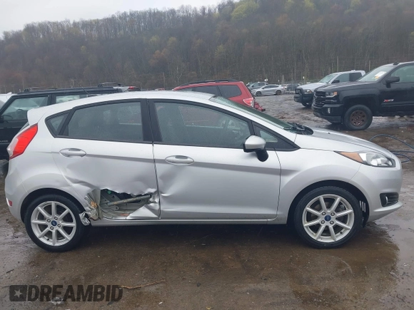 2019 Ford Fiesta SE with VIN 3FADP4EJ5KM137818, listed as a IAAI auction lot 42005468 with 110,560 mi miles and . Bid and sale history available at DreamBid. Image 13.