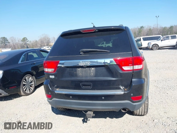 2013 Jeep Grand Cherokee Overland with VIN 1C4RJECG7DC644822, listed as a IAAI auction lot 41658872 with 156,838 mi miles. Bid and sale history available at carsss.com. Image 16.