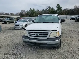 1999 Ford F-150 with VIN 1FTRF17W1XNA20017, listed as a Copart auction lot 84550234 with Not provided miles and Salvage title. Bid and sale history available at DreamBid. Image 11.