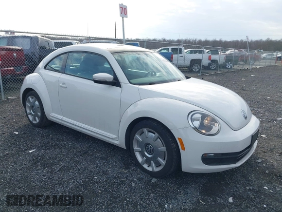 2014 Volkswagen Beetle 2.5L w/Sun with VIN 3VWJP7AT8EM611560, listed as a IAAI auction lot 41488488 with 140,798 mi miles and . Bid and sale history available at DreamBid. Image 1.