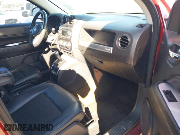 2016 Jeep Compass Latitude with VIN 1C4NJDEB1GD662807, listed as a IAAI auction lot 41161996 with 128,030 mi miles. Bid and sale history available at carsss.com. Image 5.