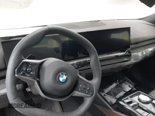 2024 BMW 5 Series 530i xDrive with VIN WBA53FJ03RCS25603, listed as a IAAI auction lot 42141231 with Not provided miles and . Bid and sale history available at DreamBid. Image 7.